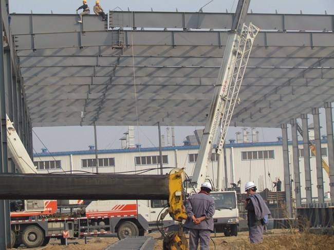 走進鋼結構廠房建設工地有感